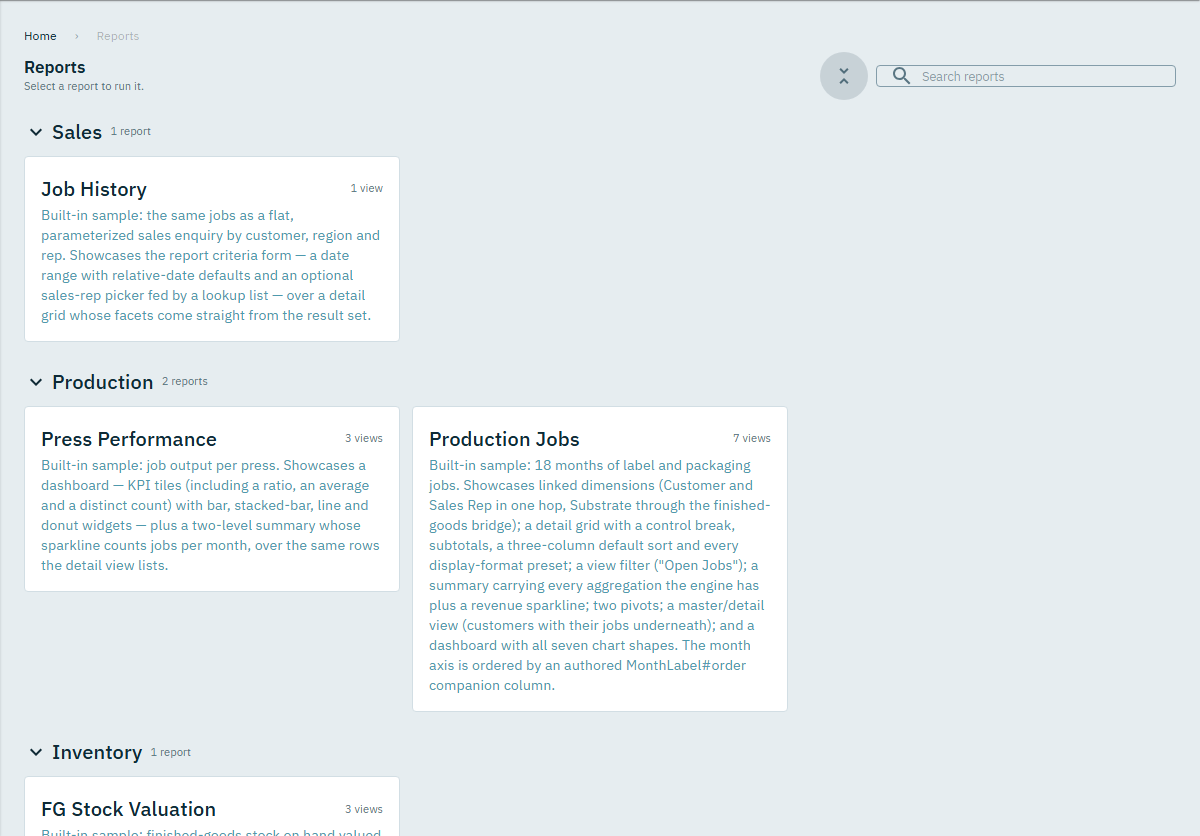 The Reports page: report cards grouped under Sales, Production and Inventory, each with a short description and its number of views